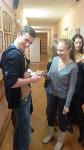 Студенты 2 курса Канц Никита и Максименко Александра выполняют задание акции